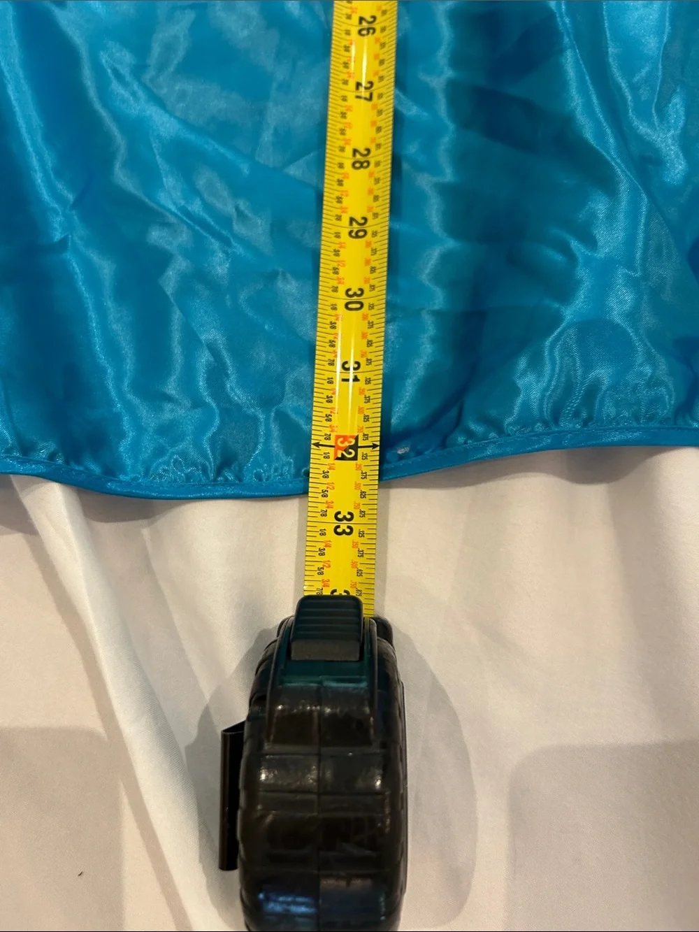 Bright blue Batman cape